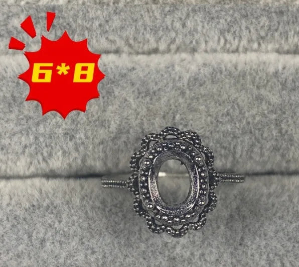 Copper oval denier ring with a 6x8 mm stone and a five-pointed star design.