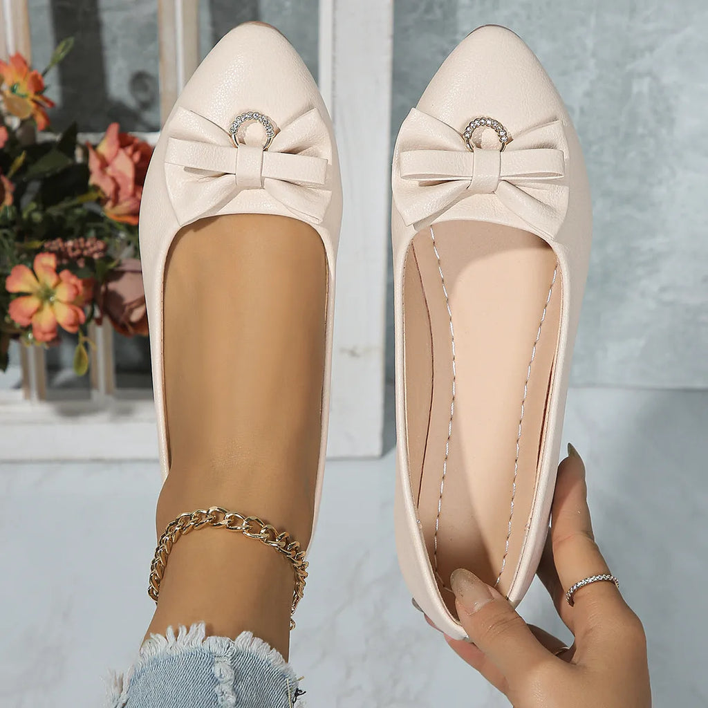 Women's beige flat casual slip-on loafers with a bow knot and shallow mouth design.