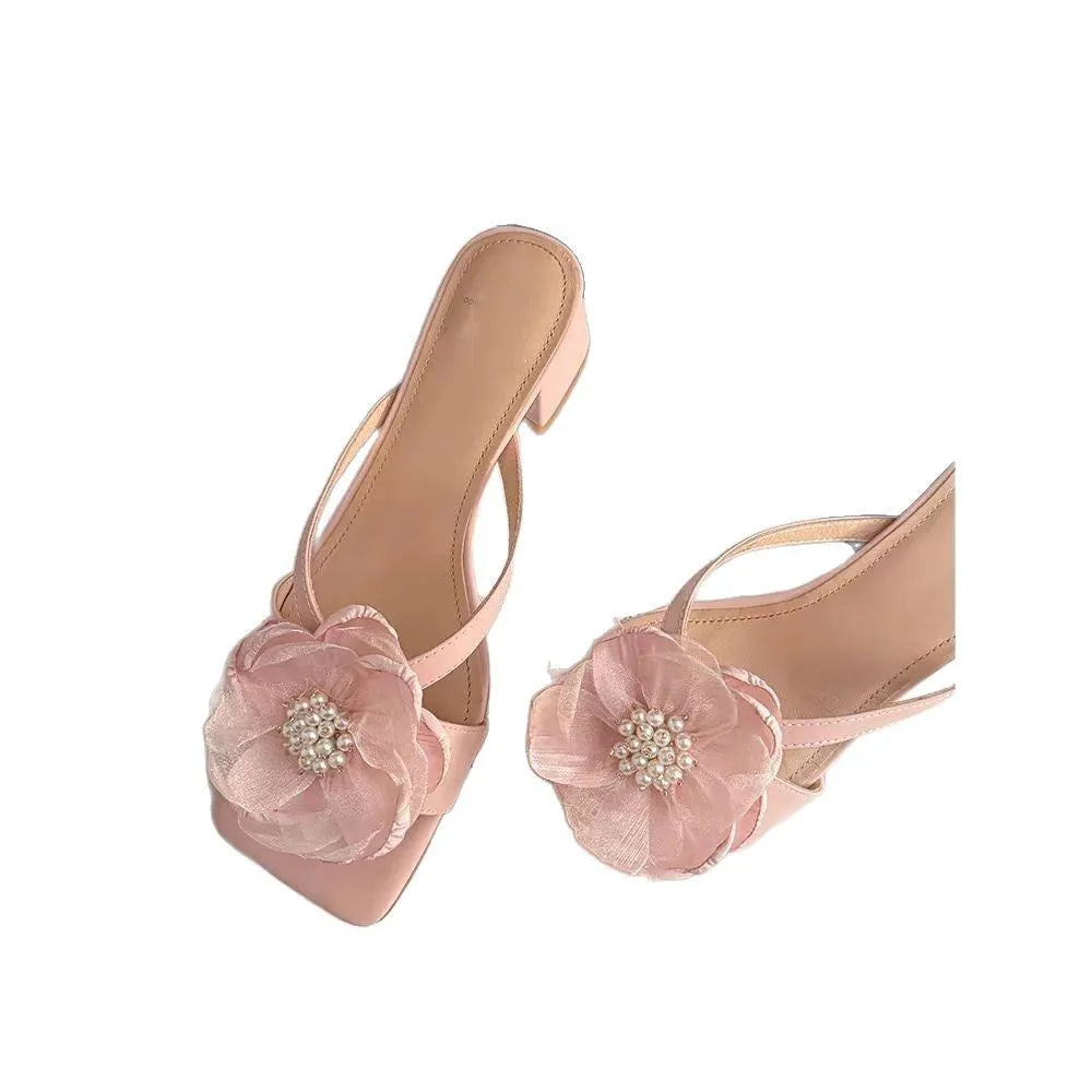 Women's cream white sandals with chunky heel, square toe, and a single satin strap.