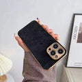 Leather-textured TPU phone case for iPhone in solid black, blue, grey, or grey-green colour.