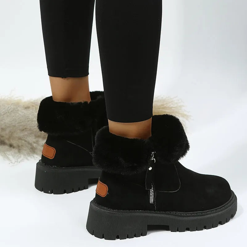 Women's black high-top snow boots with side zipper, plush lining, and non-slip rubber sole