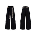 Men's dark blue straight-leg cotton jeans showing 3D cutting, belt stitching, and zipper pocket details.