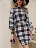 Black tight dress with lantern sleeves and leather stitching detail in midi length