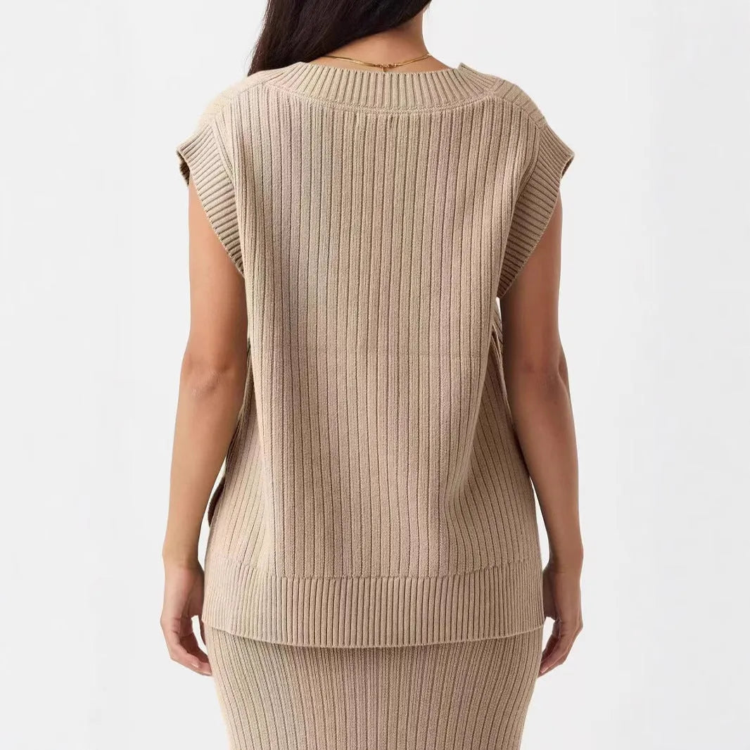Camel coloured loose fit V-neck sleeveless vest with striped pattern on hanger