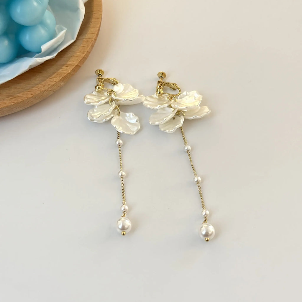 Women's acrylic shell pearl tassel earrings showing 8.8cm length and clip attachment options