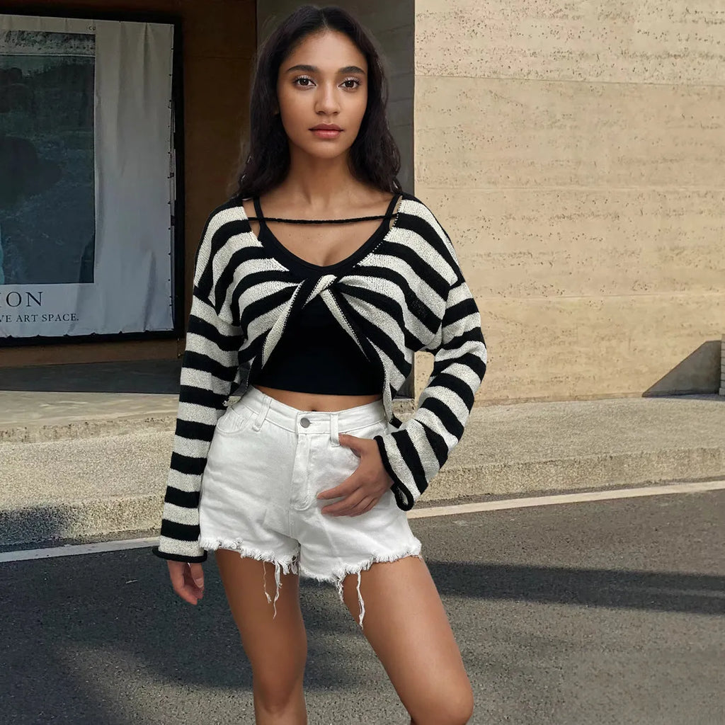 Striped long-sleeve pullover sweater in Mercerised cotton, shown in multiple colours, highlighting front/back wearable design.