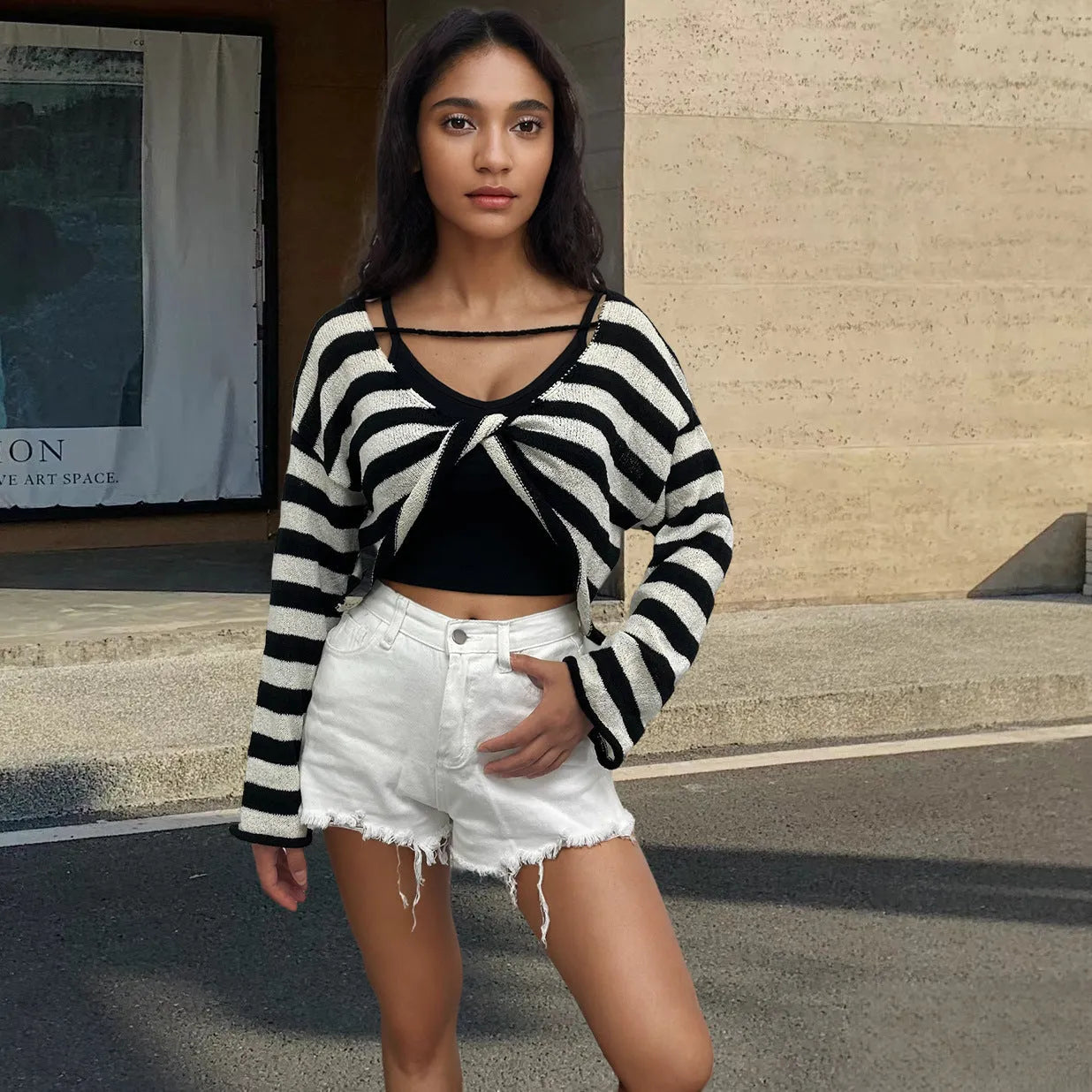 Striped long-sleeve pullover sweater in Mercerised cotton, shown in multiple colours, highlighting front/back wearable design.