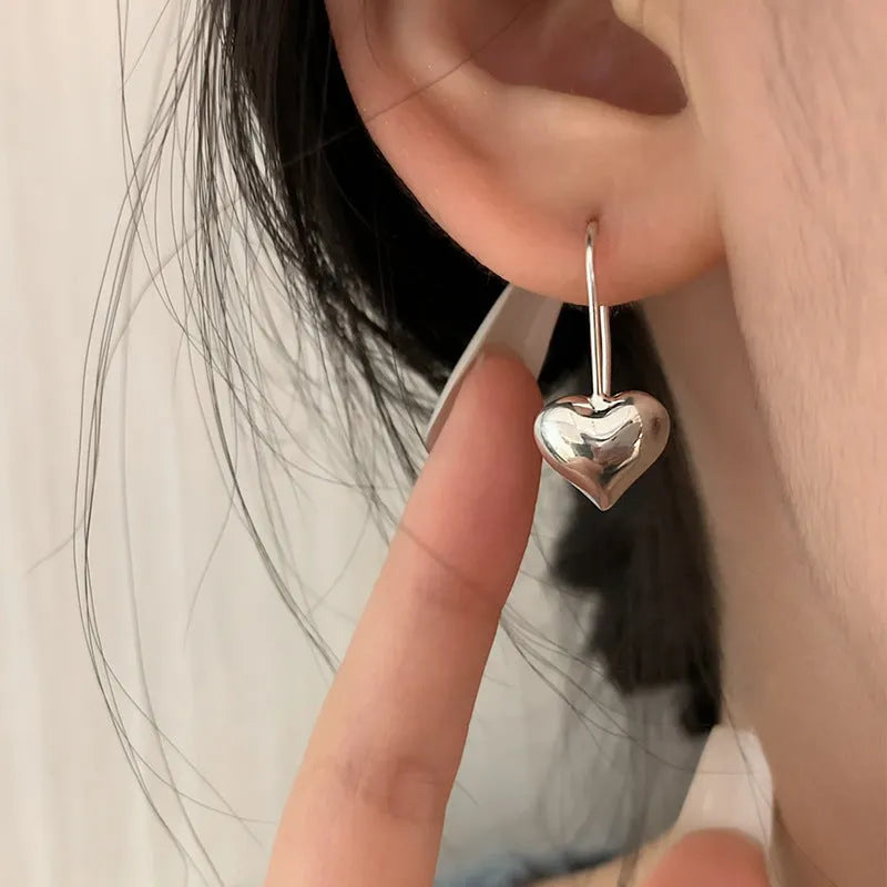 Korean style glossy heart-shaped copper earrings with silver finish for women
