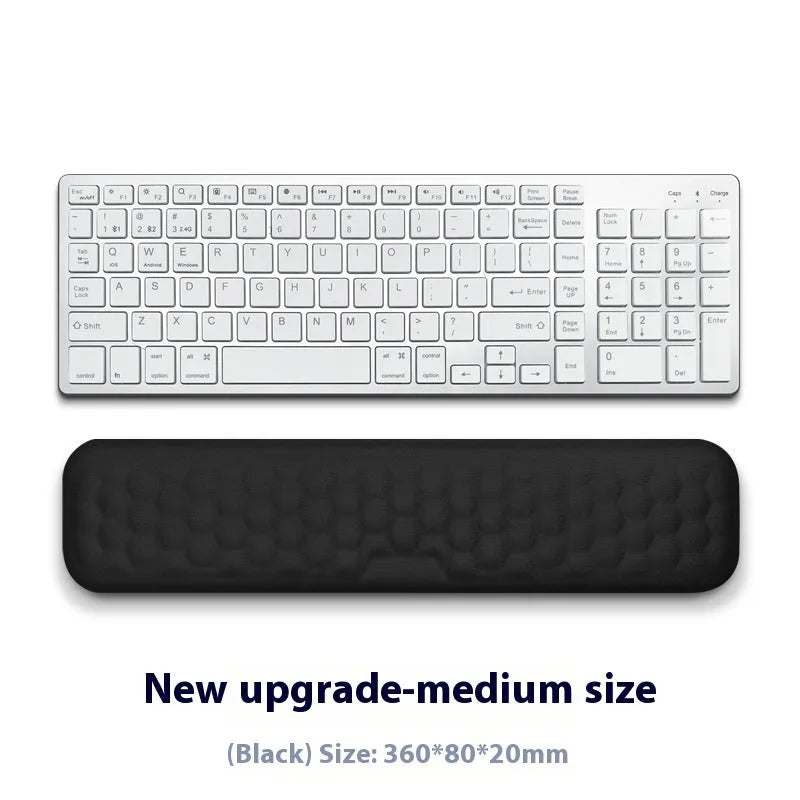 Gray cloth cover mouse wrist pad with memory foam and silicone base on a desk