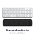 Gray cloth cover mouse wrist pad with memory foam and silicone base on a desk