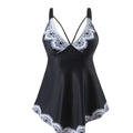 Green plus size two-piece bikini swimsuit with backless design.