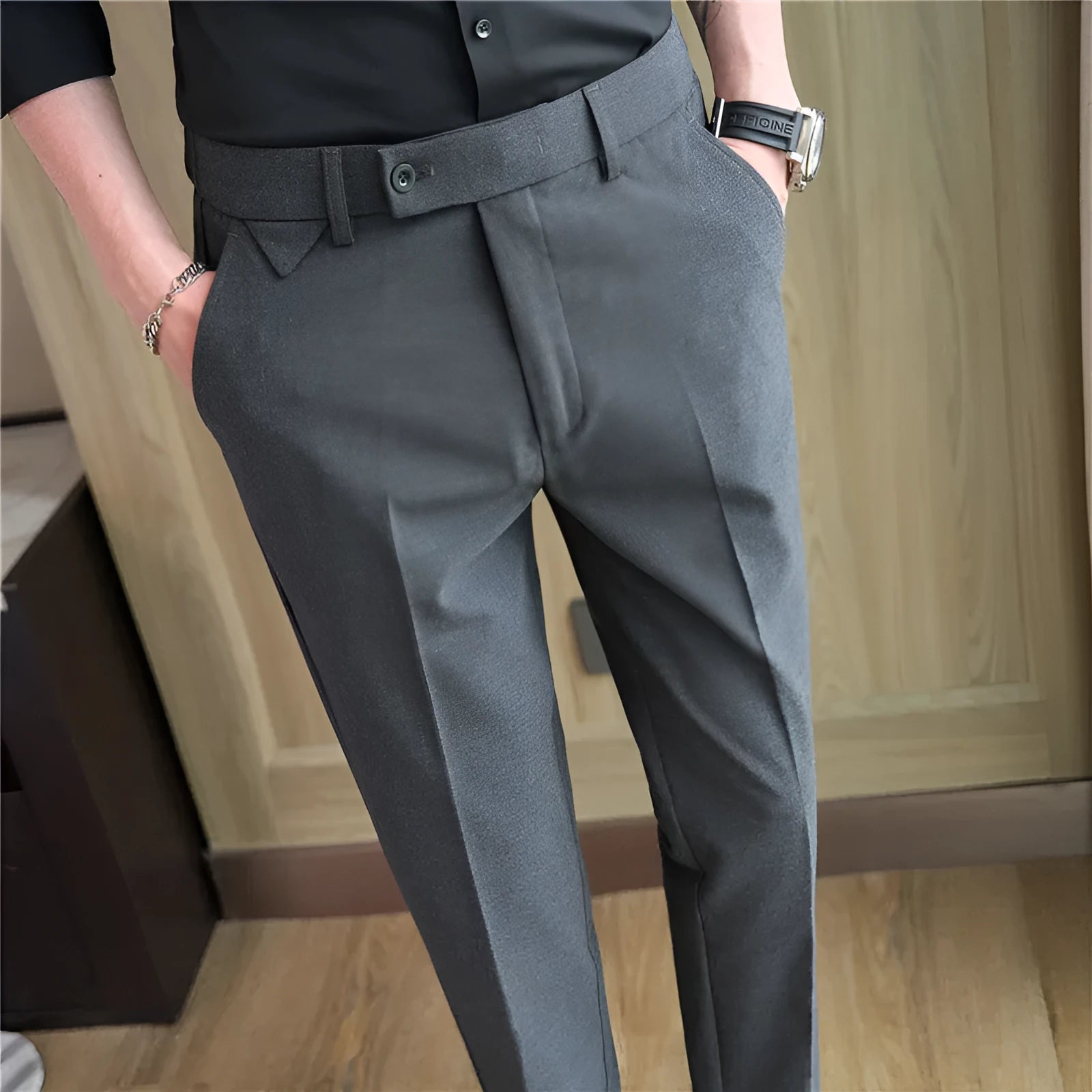Men's brown suit trousers with waist stretch design, slim-fitting small straight cut, side view on hanger