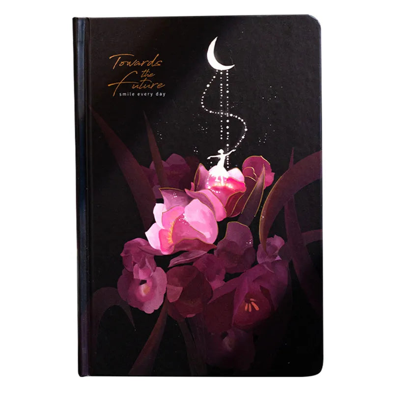A5 notebook with luminous reflective cover shown in four colours: deep blue, gold, light blue, purple, open to reveal pages with colour illustrations.