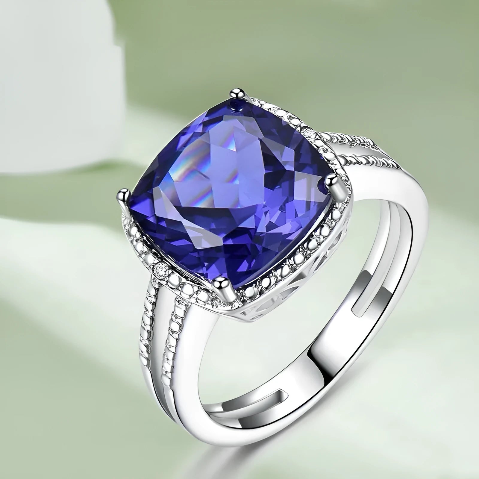 Women's sterling silver ring with blue tanzanite stone showing band detail