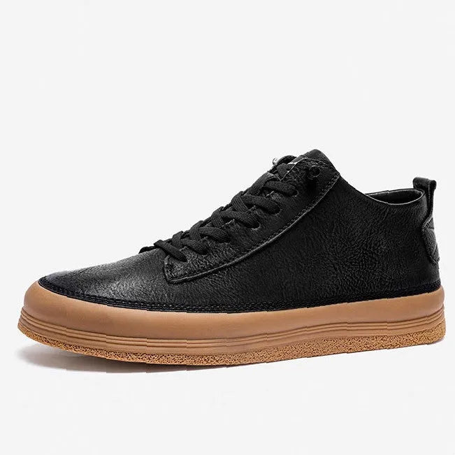 Men's black casual leather shoes with round toe, flat heel, and lace closure on a white background