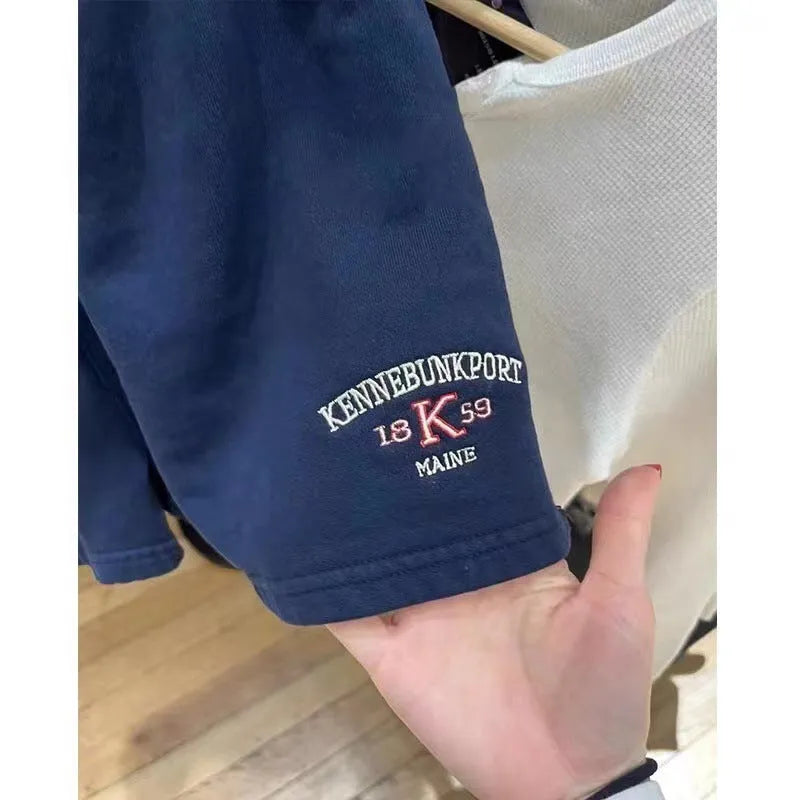 Women's dark blue cotton high-top shorts with white flag embroidery detail