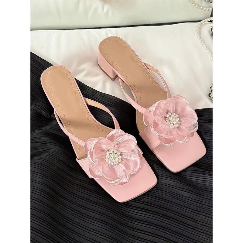 Women's cream white sandals with chunky heel, square toe, and a single satin strap.