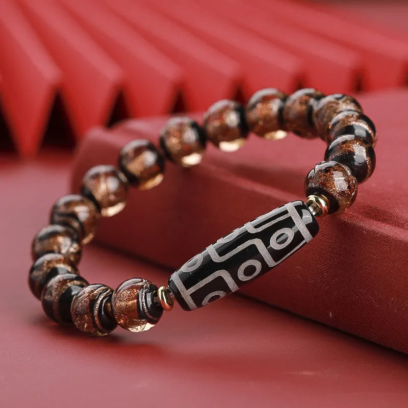 Handmade coloured glaze bracelet with auspicious patterns and year snake motif in Chinese style