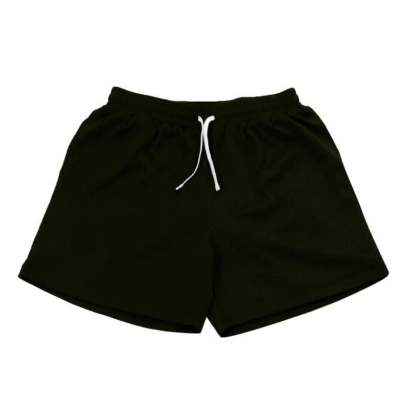Men's solid colour mesh quick-drying shorts for running and fitness in summer.
