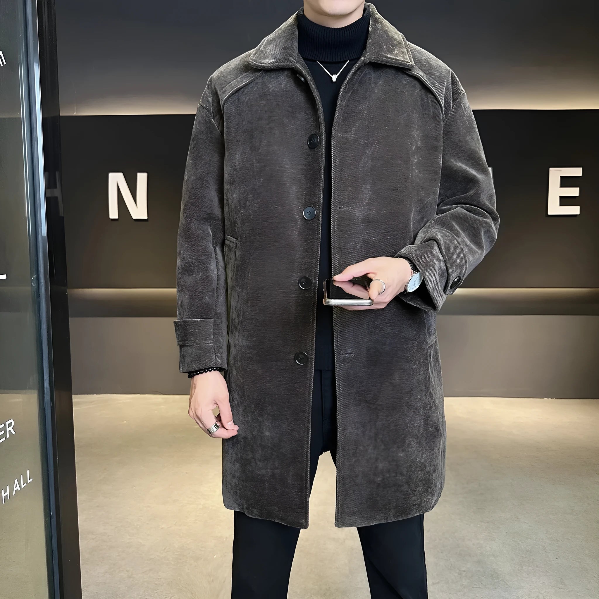 Long brown cotton wool blend jacket with thickened windproof construction, regular fit, and polyester lining, shown front view.