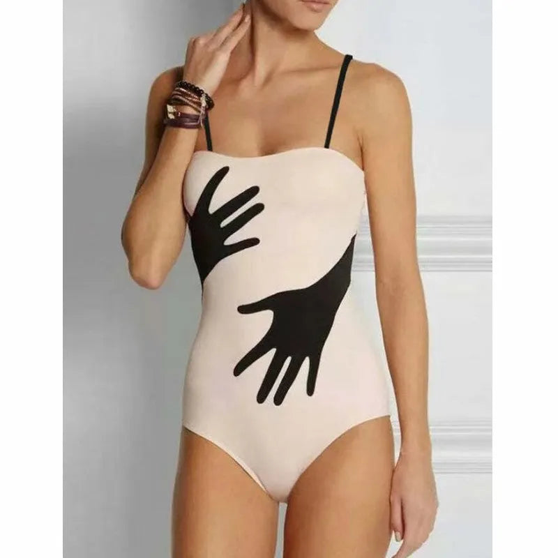 Women's polyester bikini two-piece set with a black tulle skirt overlay.