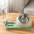 Brown elevated cat food bowl with automatic water dispenser bottle