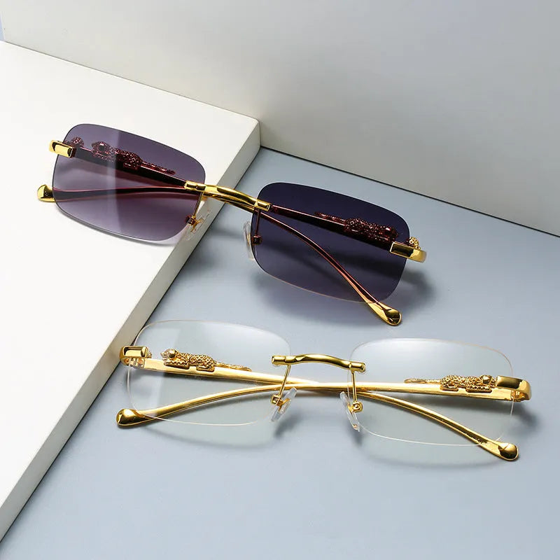 Gold metal leopard head frameless square sunglasses with pink PC lenses on a white background