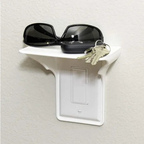 White plastic socket rack organiser with 12 slots for 1/4-inch wrench accessories measuring 14cm long