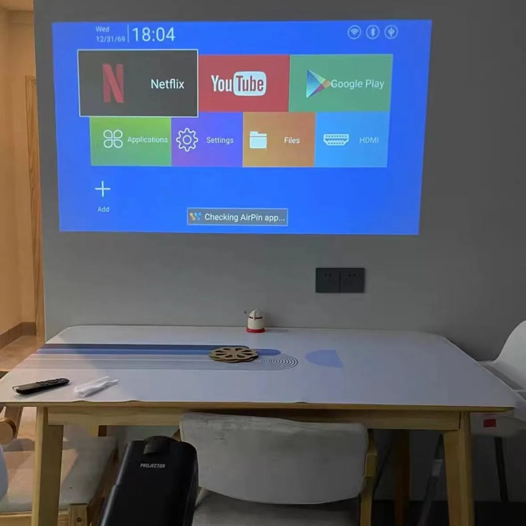 Home projector with wireless capability and screen handle for gaming and entertainment projection