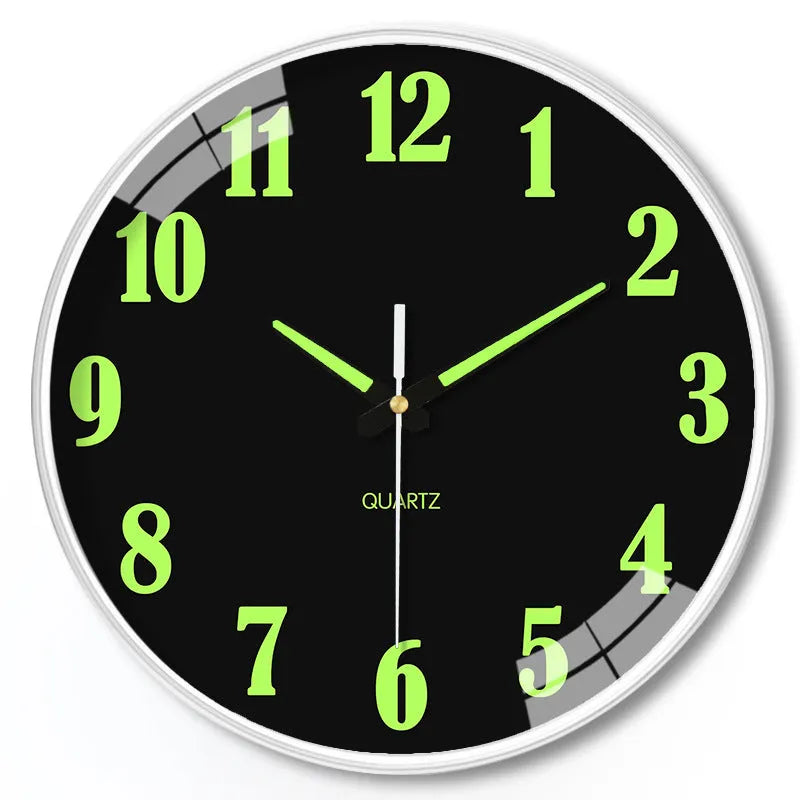 8 inch modern wall clock with luminous hands and black numerals on a light dial.