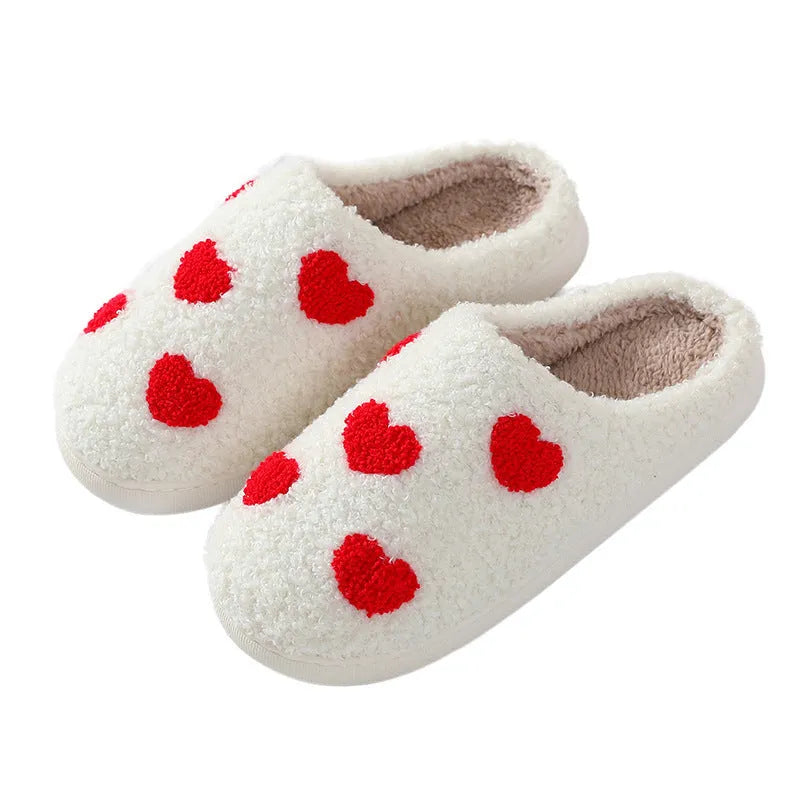 Women's plush home slippers with cartoon love print and non-slip PVC sole