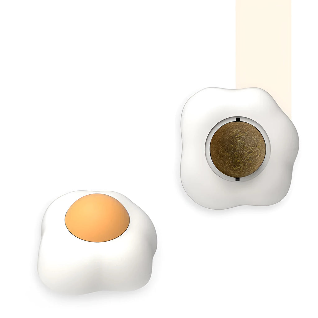 Interactive catnip ball toy in egg shapes for wall attachment and teeth cleaning