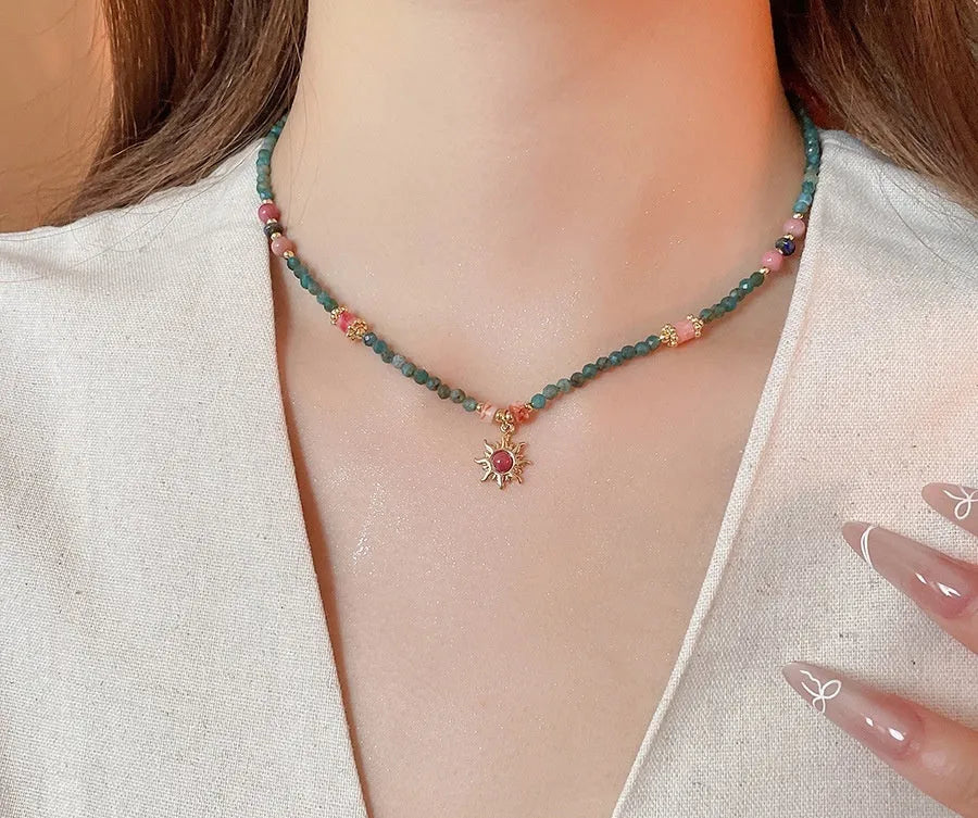 Freshwater pearl necklace with stone sun pendant, French court style, blue and golden-blue-pink colours
