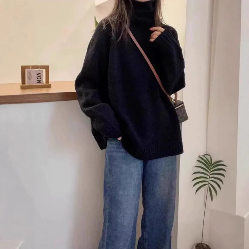 Women's loose turtleneck sweater with a thick curling pile collar in a solid colour