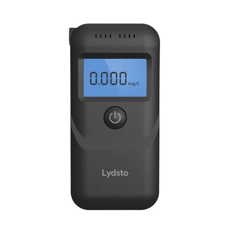 Black household alcohol tester with digital display for breath checking