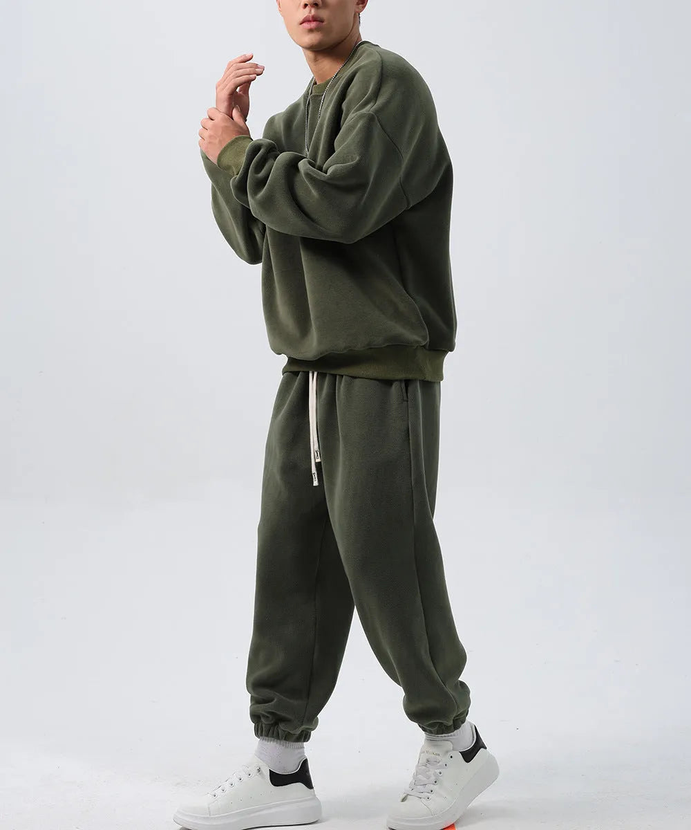Men's polar fleece winter sports suit set showing crew neck coat and padded trousers in double-sided fleece fabric