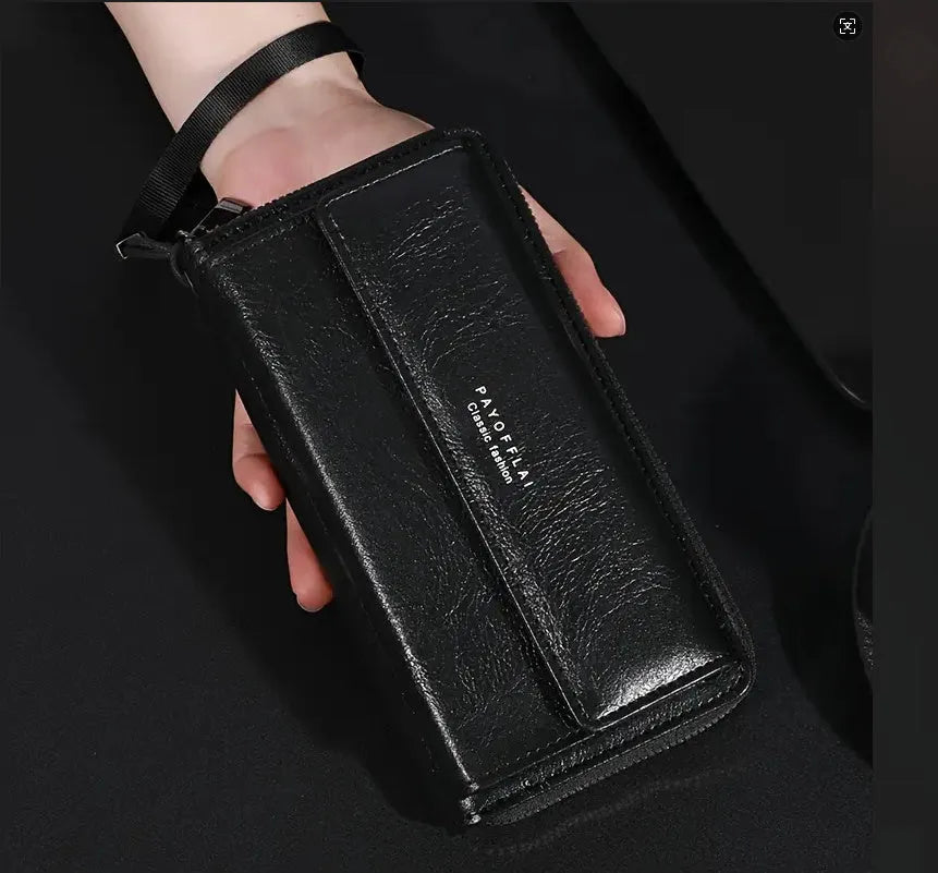 Men's black PU leather long wallet with multiple card slots, shown closed.