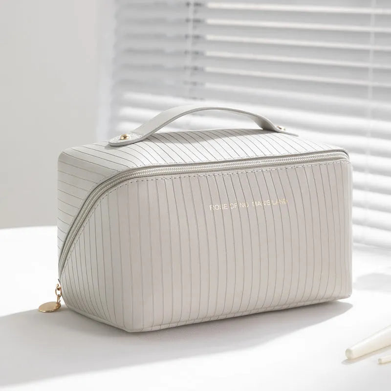 Vertical pattern cubic makeup bag in PU material with 22.5cm height for travel storage