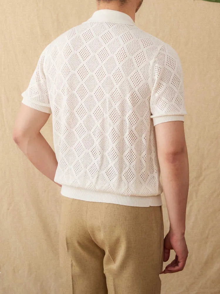 Light brown cotton short sleeve cardigan with lapel collar and full-length front zipper.