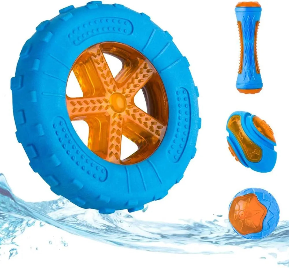 Three floating dog toys: a blue squeaky ball, a red barbell, and an orange tyre on a blue background.