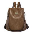Women's black anti-theft backpack with woven details and multiple compartments