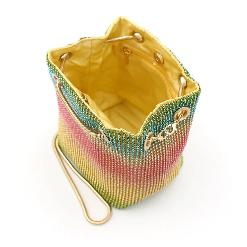 Soft rhinestone bucket bag with sparkling fabric texture in a selected colour