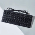 Compact wired USB mini keyboard in black with noiseless keys and 1.3 metre cable