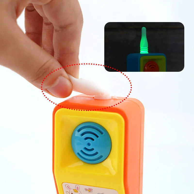 Children's educational toy with cartoon animal design featuring sound and light functions