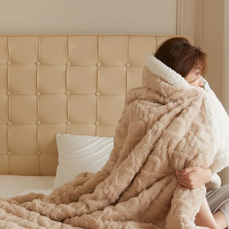 Polyester thermal flannel blanket in tea green colour, shown on a bed, size 180x200cm.