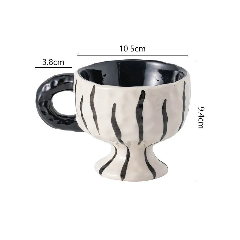 Hand-pinched irregular ceramic mug in solid colour with modern design and 14.5cm height