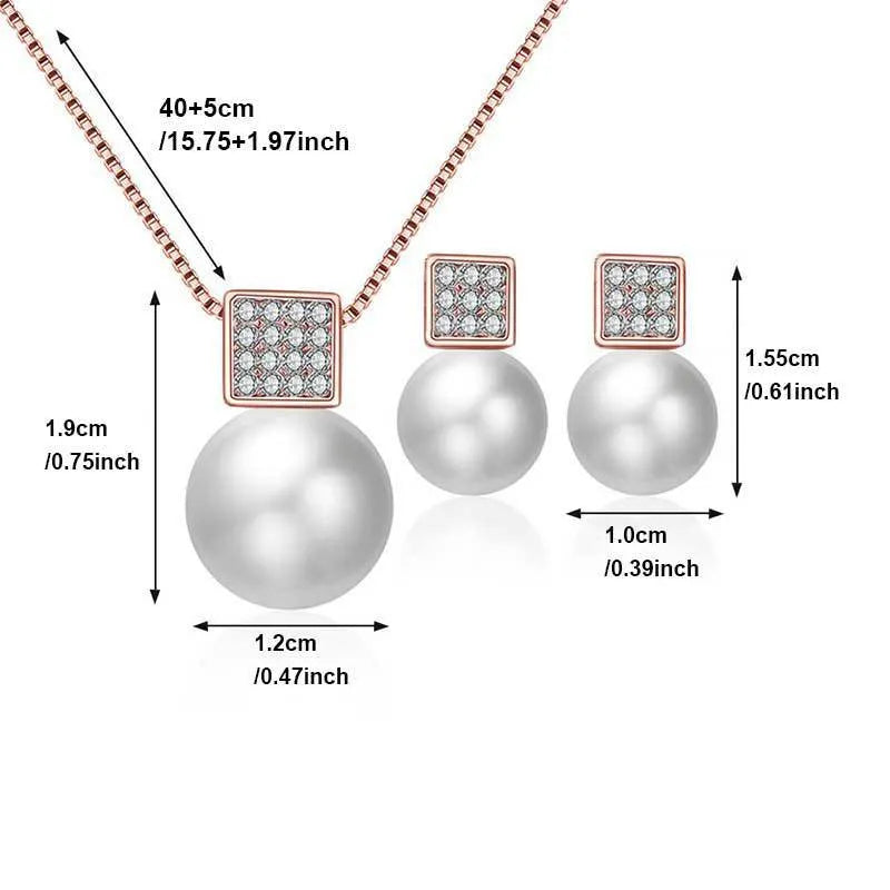 Versatile jewellery set with necklace and earrings featuring rhinestone cube pendants in rose gold finish