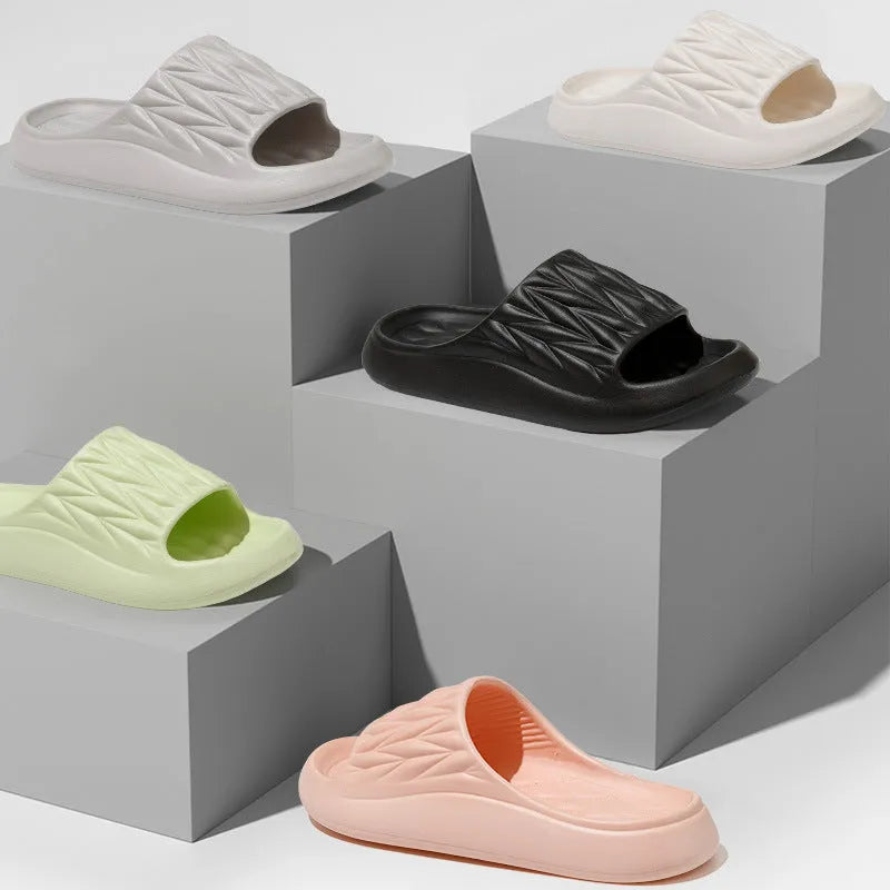 Leaf texture design EVA household slippers in various colours on a non-slip sole.