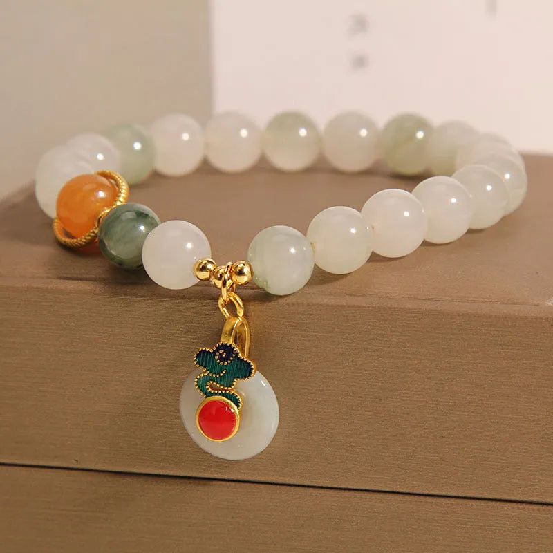 Ice jade crystal bracelet for women with pearl details and a peace jade buckle.