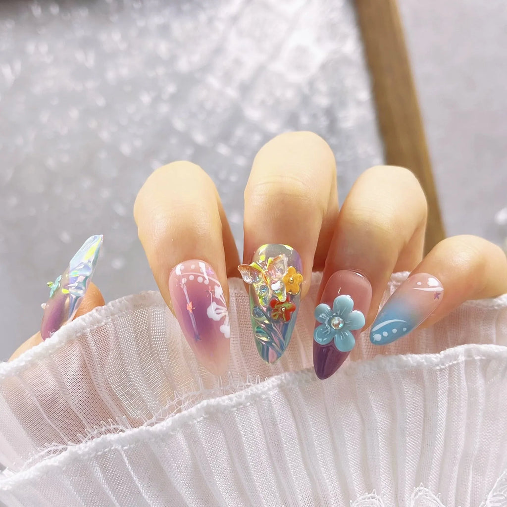 Handmade colourful small flower and butterfly sculpture manicure nails in floral patterns